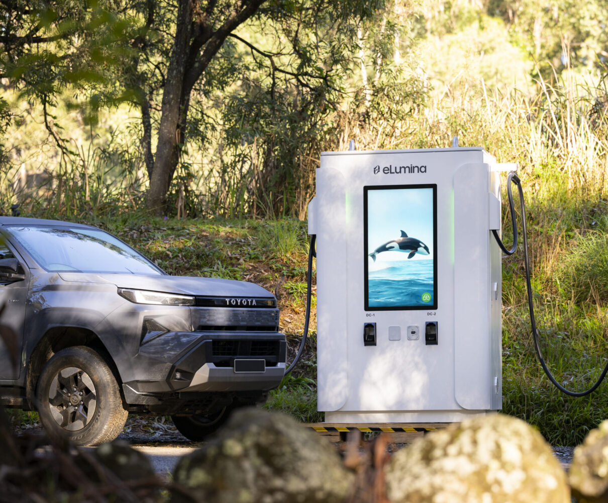 two EV cars charging